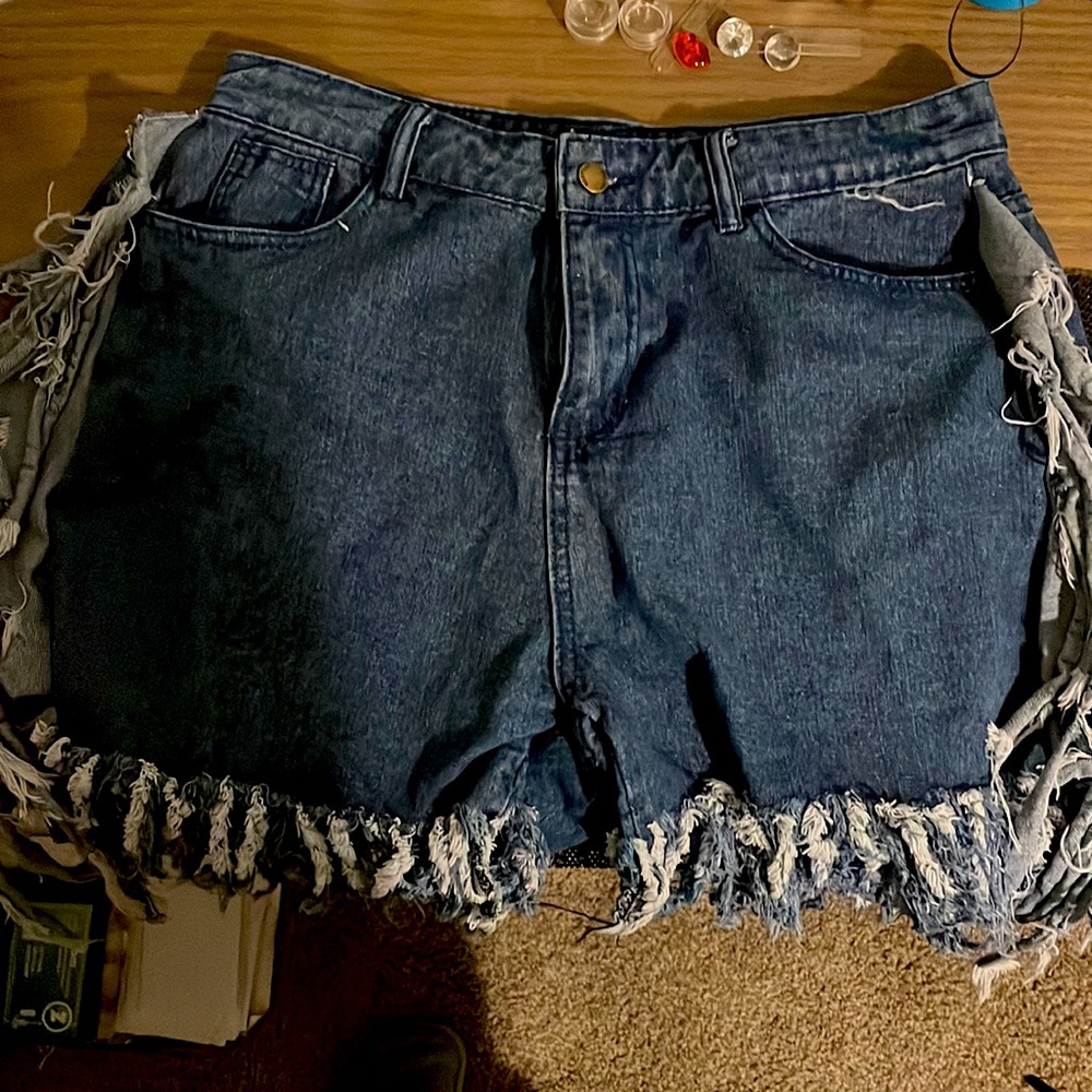 Shredded jean shorts